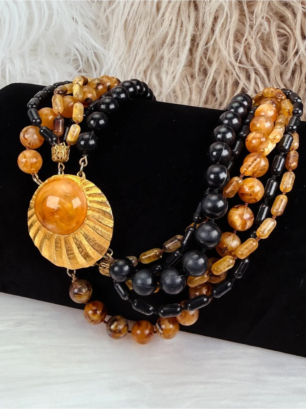 Vintage Multi Strand Black Amber Tone Bead Necklace Gold Tone Centerpiece